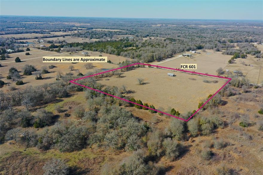 Versatile Open Terrain that provides the perfect blend of rural privacy and modern accessibility just 7 minutes from I-45, approx. 90 miles south of DFW. Whether you are looking to move an RV onto the lot immediately or start construction on a custom home, this site is prepared for your vision & with no deed restrictions.  Approximately 11.2 acres of cleared, open land offers a blank canvas for building, gardening, or small-scale agricultural projects & ag exemption is already in place. RV-Ready setup with water, electricity, cover & slab, providing essential protection and convenience for full-time living or recreational visits. South Freestone County Water membership will be transferred to buyer.
