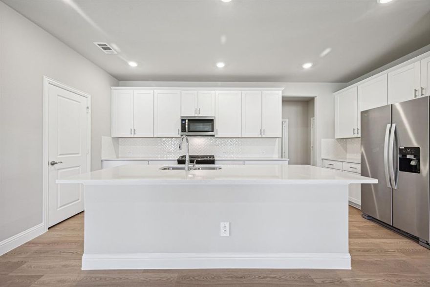 Brand new, energy-efficient home available by Dec 2025! Try a new recipe in the Woodside’s impressive kitchen, complete with a useful island and large pantry. White cabinets with veined white quartz countertops, tan tone EVP flooring with dark beige tweed carpet. Situated perfectly in a small town, Stonehaven homeowners will enjoy the benefits of an effortless commute to Dallas using nearby I-20 and Highway 175. This serene community also boasts amenities including a resort-style pool, kid's splash pad, cabanas, and a children's playground. Schedule a tour and see our energy-efficient features like multispeed HVAC systems, spray foam insulation, and high-performance air filtration.*  Each of our homes is built with innovative, energy-efficient features designed to help you enjoy more savings, better health, real comfort and peace of mind.