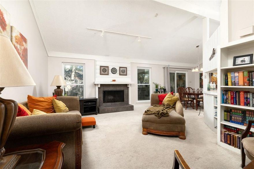 It's time to Relax and Enjoy this awesome home located in a well established neighborhood on a quiet Cul-de-sac. It offers 2 bedrooms split and 2 baths, 1 Living area and 1 Dining area. Kitchen is quaint with lots of cabinets, breakfast bar, plant ledges, ceramic tiled countertops plus backsplash, Wood burning fireplace accented with gray tile. Great backyard with large deck for relaxing or entertaining Upgrades include AC Trane - 2911, New windows and sliding door - 2013, Large backyard deck half-covered was a partial replacement - 2025.  Refrigerator remains. The property is close to Meadowbrook Golf Course.