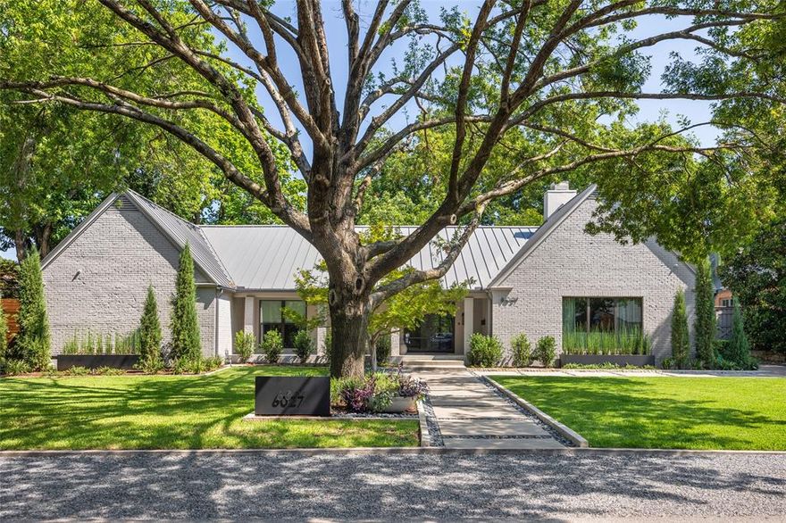 Nestled on one of the most charming and tree-lined streets in Preston Hollow, 6027 Mimosa Lane is a true designer’s dream. This beautifully updated, move-in-ready home offers four bedrooms (including a stunning primary suite on the first floor), 6.5 baths, two spacious living areas, and an upstairs game room—perfect for both relaxing and entertaining. The custom Ornare kitchen is a chef’s delight, featuring sleek built-in Miele appliances, sophisticated finishes, and abundant storage throughout. Step outside to your private backyard oasis, where mature trees create a serene setting around the pool and hot tub. A built-in outdoor kitchen and covered patio make this home ideal for gatherings year-round. With its thoughtful design, high-end details, and inviting spaces inside and out, this Preston Hollow gem effortlessly blends style, comfort, and livability.