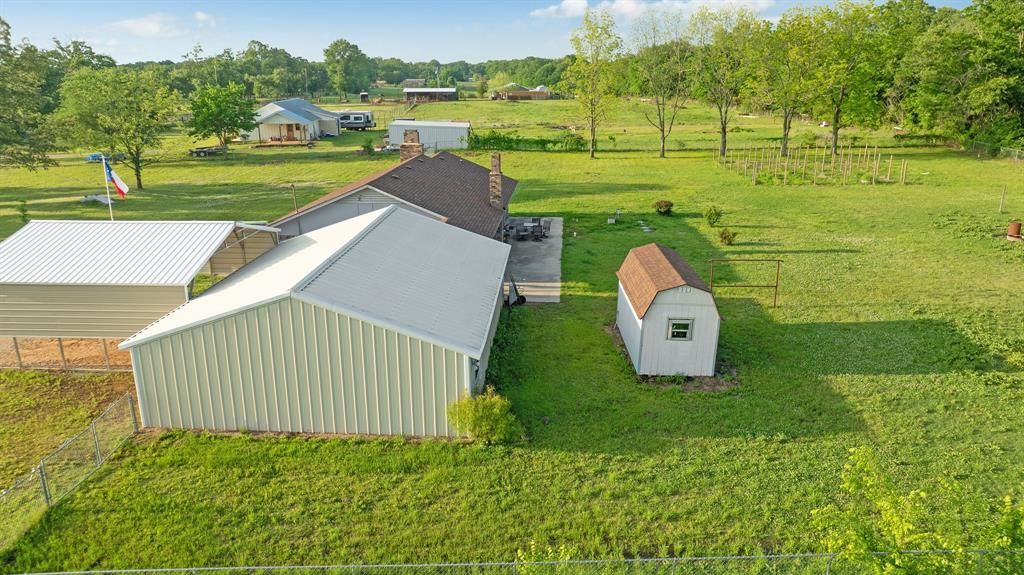Photo of 150 CR 35980, Arthur City, TX 75411 (MLS # 21248113)