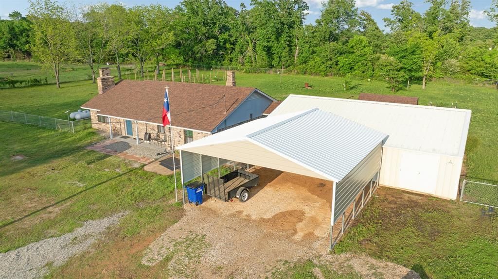 Photo of 150 CR 35980, Arthur City, TX 75411 (MLS # 21248113)