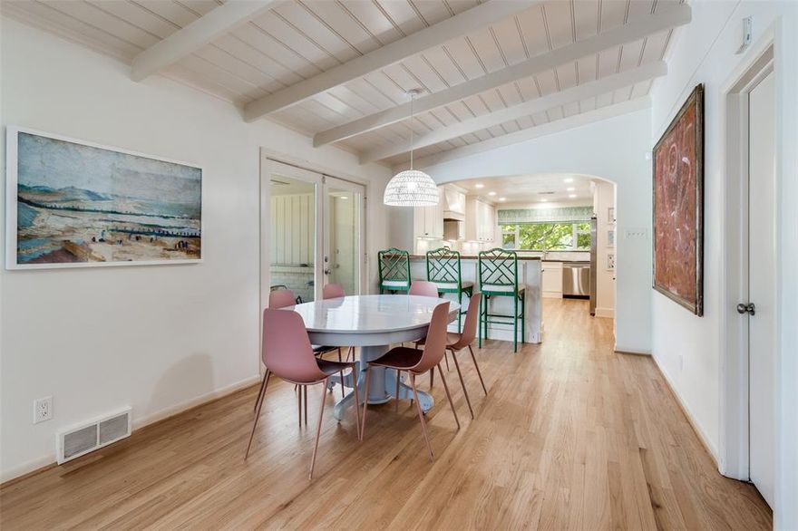 Fantastic location adjacent to University Park nestled on a spacious 100' x 169' corner lot with huge back yard!  This wonderful one-story home offers plenty of room to play, garden, or even add a pool — the possibilities are endless! Inside, you’ll find three bedrooms, two-and-a-half baths, and two living areas filled with natural light, making it easy for everyone to find their favorite spot to relax.  The beautifully updated kitchen opens to a breakfast area and living room overlooking the spacious backyard.  Step outside to the backyard oasis, where there’s plenty of space for kids, pets, and outdoor fun. The outdoor cooking area makes it easy to grill, entertain, and enjoy time with friends and loved ones.  This home truly has it all — space, comfort, and a welcoming atmosphere in a fantastic location.