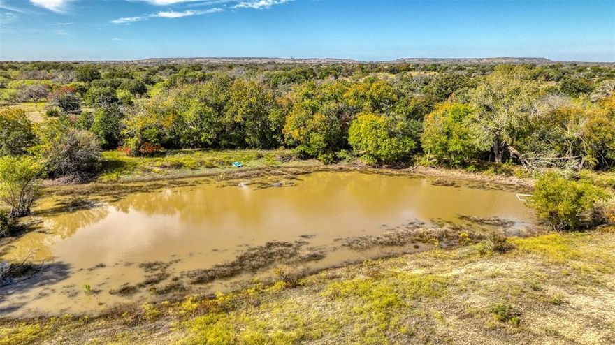 This low-fence, cross-fenced property is enrolled in MLD, allowing for an extended deer hunting season and additional tags, making it a hunter’s paradise. With approximately 80 acres of terraced dryland farming, you’ll have plenty of space to plant sunflowers in the spring and wheat or oats in the fall. At the end of your own deeded lane, your perfect ranch home awaits. This custom-built 4-bedroom, 2.5-bath home offers 2,744 square feet of living space constructed with ICF blocks, providing exceptional energy efficiency and strength—ideal for unpredictable Texas storms. Enjoy your morning coffee or sunset views from the spacious 9-foot attached porch, while the 2,320-square-foot shop, built in 2008, with water and electricity provides ample workspace for all your outdoor equipment. You’ll also find a 1,500-square-foot hay barn and a cattle sorting pen, perfect for your farming or ranching operation. With a past MLD tag quota of 20 bucks and 20 does, this property is more than just a home—it’s an investment in your family’s legacy. Located just 2 hours from DFW or Austin, it’s the ideal getaway for those seeking seclusion from city life. This property is ready for you to make it your own, whether that means adding a roping arena, rifle range, sporting clay course, or anything else you envision.