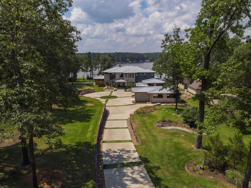 Enter the gates of the Eagle Point community passing the water feature as you meander tree canopied streets to the crown jewel of Lake Cypress Springs, This Copeland built one of a kind one owner home has never been offered on the resale market.  This industrial modern masterpiece offers the finest of quality, craftsmanship, amenities & finishes with exceptional style by interior designer Elle Cole. Lake Cypress Springs, found in the Piney Woods region of TX, surrounded by rolling hillsides, is a clear spring-fed haven among Texas lakes locate approx. 2 hours east of downtown Dallas. The treed lot is exceptional & has one of the greatest locations on the main body of the lake. 5 bedrooms, 7 baths,multiple living centers, media, bar, two outdoor living areas, two fireplaces,pool-spa putting green,boathouse. Inlaid metal mahogany doors, Level 4 interior wall finishes, gleaming hardwoods & the finest use of Quartz, limestone, steel, wood, glass & rich textures create this masterpiece.