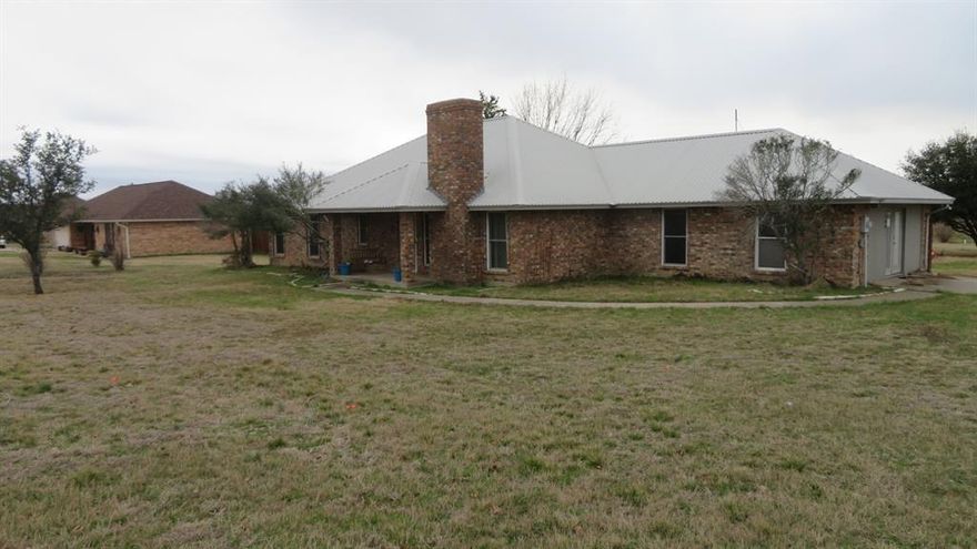 Serene Country Living on 1.556 Acres.  Escape to peaceful country living with this beautifully  4-bedroom, 2-bath home situated on a sprawling 1.556-acre lot. This home features a spacious open-concept floor plan with generously sized bedrooms and a cozy brick fireplace, perfect for relaxing evenings. Located within the sought-after Maypearl ISD, which includes Lorene Kirkpatrick Elementary. The property also boasts a large 30x30 metal building with a two-car garage, offering ample space for storage or hobbies. To top it off, unwind and enjoy your own private cement pool, an ideal retreat for hot summer days.