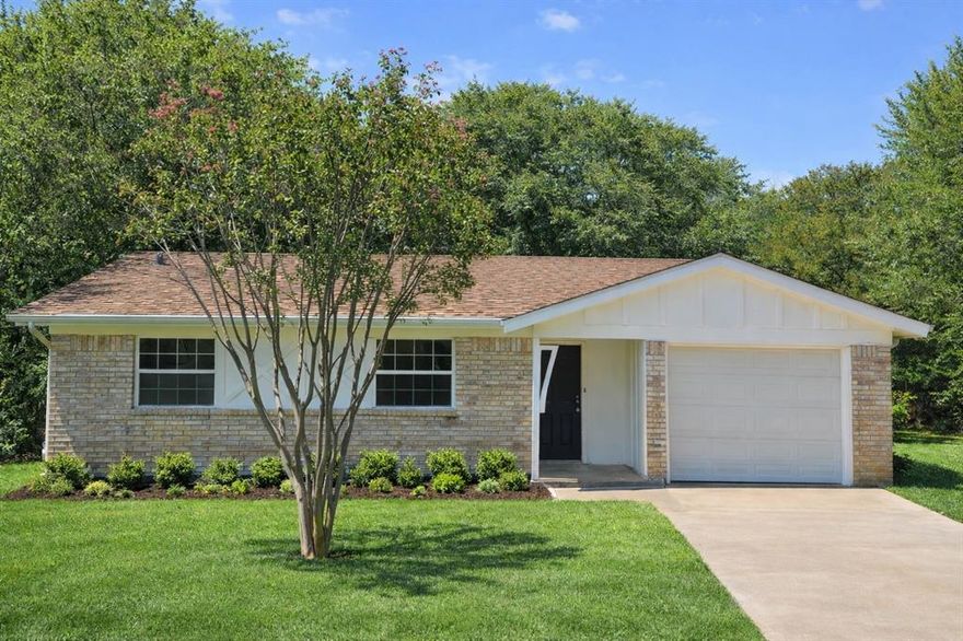 7129 Payte Lane in North Richland Hills, a beautifully UPDATED 4-bedroom, 2.5-bathroom home offering 1,487 sq ft of COMFORTABLE living space. Set on a quiet .28-ACRE LOT at the end of a PRIVATE dead-end street, this property is surrounded by MATURE TREES, providing both privacy and charm. The home has been thoughtfully updated with brand-new FLOORS, recent WINDOWS, fresh PAINT, new kitchen CABINETS, QUARTZ countertops, and new STAINLESS STEEL appliances. A fully permitted primary suite ADDITION in 2013 created a SPACIOUS modern primary bedroom, bath, and walk-in closet. The flexible, MULTI-GENERATIONAL floor plan includes two bedrooms with ensuite baths, making it ideal for in-laws, guests, or older children. Outside, enjoy a stick-built 12' x 15' SHOP on a slab foundation—perfect for hobbies, storage, or a workshop. Zoned to Birdville ISD, including the newly built Smithfield Elementary, highly rated Smithfield Middle, and popular Birdville High School. Conveniently located just minutes from Davis Blvd and a short drive to 820 & 183, this home combines modern updates, versatile living spaces, and an excellent location—perfect for first-time buyers or anyone seeking a move-in ready property in North Richland Hills.