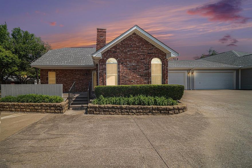 Move in Ready! 3 bedrooms, 2.5 bath condo with 2 car garage, gas fireplace and large patio. Ceiling fans in every room. Solar Screens on the windows to help keep the condo cool in the summer. Freshly painted. New luxury plank flooring throughout the downstairs. The primary bathroom and half bath, both downstairs have been recently updated.  The upstairs houses the 2nd primary bedroom with new carpet and a full bathroom. This spacious room can also be used as an entertainment room instead of a bedroom. Like new Refrigerator and Washer, Dryer will convey.  Villas on the Bluff is a popular sought-after community located in beautiful, wooded, gated community that has so much to offer. You can enjoy the community swimming pool, fitness room, clubhouse. There is a gazebo with a front row view of the bluffs where you can also take in spectacular sunset views. In addition, there is shopping and restaurants close by and only minutes to Waterside, Clearfork, and the Trinity Trails.  Look no further this is the home for you.