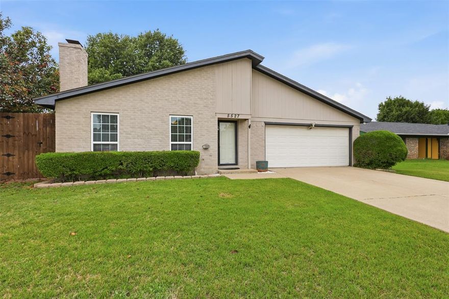 Not everything worth having is brand new. This 3 bed 2bath corner lot charmer in North Richland Hills has the kind of personality that’s hard to find — cozy enough to feel like home from day one, yet with a layout that gives you room to grow.
Inside, vaulted ceilings and a sunken living room create an open, inviting atmosphere, while the wet bar and wood-burning fireplace make entertaining effortless. The oversized secondary bedroom with Jack-and-Jill bath access offers flexibility for guests, a home office, or multigenerational living.
Step outside to your own private retreat — a sparkling pool, beautifully stained privacy fence, and a 10x20 shop with built-in shelving and electricity, perfect for hobbies, projects, or extra storage. Sitting on a 0.20 acre corner lot with no HOA and zoned to Birdville ISD, you’re just minutes from shopping, dining, the NRH Centre, and Loop 820.