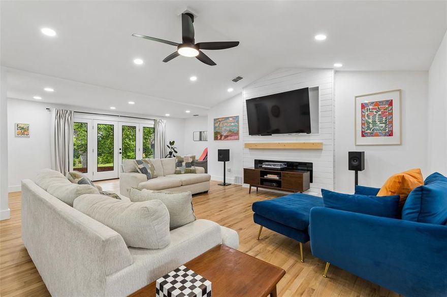 Set on a spacious corner lot, this beautifully remodeled ranch is the perfect blend of modern style and effortless livability. Step inside to crisp white walls, soaring vaulted ceilings, & warm hardwood floors that create a bright, inviting backdrop for everyday living. At the heart of the home, a thoughtfully designed gourmet kitchen steals the show—featuring double ovens, commercial cooktop & range, generous island, walk-in pantry, & sleek pot filler—seamlessly opening to the den for easy entertaining. The living space is both stylish & comfortable, anchored by a contemporary fireplace, expansive art walls, & stunning bank of windows that flood the home with natural light (your plants will love it). Function meets flexibility with a rare, oversized laundry room for a home of this era, plus a dedicated office perfect for working from home or creative pursuits. All of this, just moments from Kiest Park—one of Dallas’s largest and most beloved green spaces, offering 263 acres of trails, playgrounds, sports courts, and a vibrant community recreation center. A home that lives as beautifully as it looks—modern, open, and effortlessly connected to both nature and neighborhood.