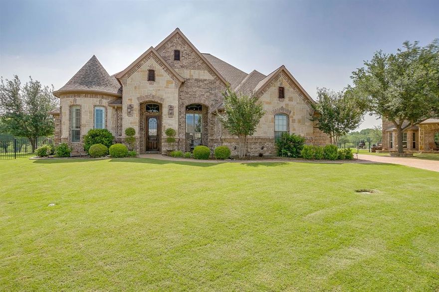 Tucked at the end of a quiet cul-de-sac in the sought-after community of The Resort on Eagle Mountain Lake, this custom one-story home offers a refined take on lakeside, golf course living. Set along the 3rd hole fairway with a private pool as your backdrop, the setting will leave you feeling right at home! Inside features 3 bedrooms, plus a separate study with built-ins and architectural details, along with a flexible bonus room which could easily be a 4th bedroom at the back with views of the backyard and golf course just beyond. The 3-car garage is a must for storing your golf cart, while the outdoor covered patio is a place you'll want to stay when you have a fireplace and heated pool you can enjoy year round! This home is also pre-wired for a generator. Another favorite feature are the 7 foot windows that flood the home with natural light, highlighting engineered wood floors and a thoughtfully designed split design. The open-concept layout creates an easy flow for both quiet mornings and hosting, while each space feels grounded in quality construction and timeless style. Life here extends well beyond the walls with morning walks, afternoons at the clubhouse, weekends spent at the lake's beach entry for play or on the lake itself, and even nature hikes just a short drive away. The lifestyle here feels like an everyday retreat!