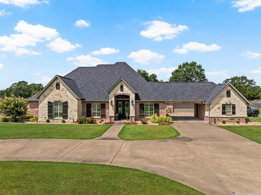 Step into luxury living at this impeccable property in Legacy Park. 3 Bedroom + Office, and 3.5 Bath. From the grand entry to the formal dining room, office, and inviting living room with a cozy fireplace, every detail of this home exudes elegance. The eat-in kitchen is a dream with granite counters, top-of-the-line appliances, and ample cabinetry. The primary suite offers a true retreat with an ensuite bath featuring a soaking tub, glass showers, and dual vanities. Hosting guests is a pleasure with two guest rooms, one featuring its own ensuite, and convenient half bath. Entertain effortlessly on the back porch with a built-in kitchen and bar, while the patio offers a serene spot to unwind and watch the kids play in the fenced yard. This is the perfect home for those who appreciate luxury and comfort in every corner. Don't miss this unprecedented opportunity to own a piece of Legacy Park in Pittsburg!