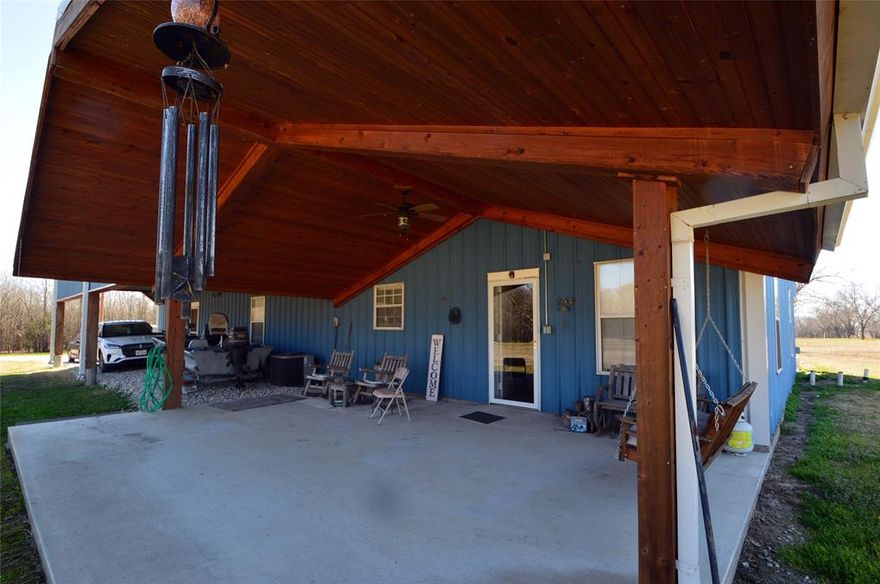 Looking to retire to the peace and quiet, or just have room to play, this home may suite all your needs. Currently in Ag, this 10 acre parcel has 2 ponds and approx 75 producing pecan trees giving you a built-in hobby, or a source of seasonal income! A gated entry and a winding driveway will lead you to a meticulously cared-for 2 bedroom, 2 bathroom, 2 car garage barndominium. Enjoy sweeping views from the massive covered front and back porches, which are perfect for evening entertaining or just enjoying your morning cups of brew! With full-length overhangs and deep porches, the current 2-2 floorplan can easily be expanded to add more bedrooms if needed. The property also features a bonus aerobic septic system (from a previous homesite), making it the ideal spot to build your dream shop or a guest house. Located in the highly-rated Lone Oak ISD and minutes from the waters of Lake Tawakoni and Lake Fork for all your water activities!