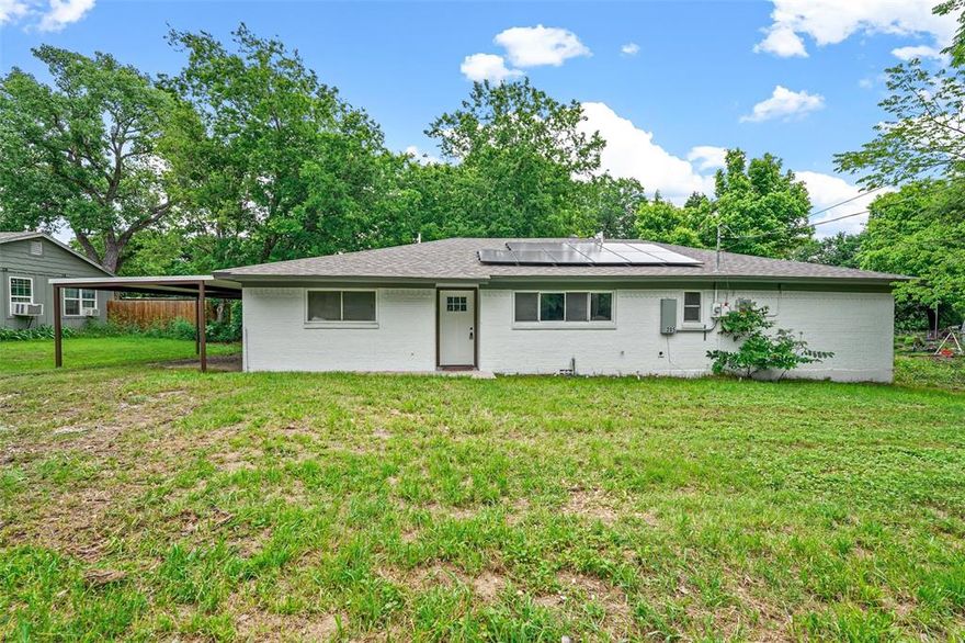 Commercial potential in Weatherford with easy access to highways and interstate. Perfect for small home business, daycare or office.  This property has 2158 square feet, with four offices and two restrooms. There are two additional areas that could be used as a conference room and perhaps a waiting room. The floorplan is open with upgrades including granite countertops and new cabinets in the wet areas, tile flooring in restrooms and laminate throughout the rest of the property. The detached garage has approximately 400 square feet of additional storage. Solar panels are paid in full and will be included with the sale. This building has been zoned C1 General Commercial.