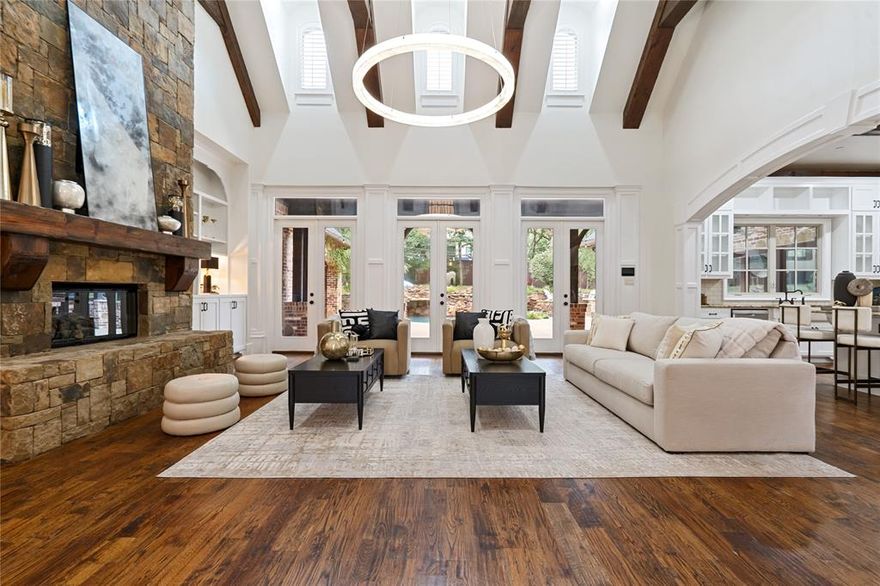 Looking for a rare and grandeur 6 bedroom home with 6 ensuite bathrooms and half bath in Keller near Westlake?

The grand circular drive and automatic driveway gate set the stage for a private retreat on .826 acres. Inside, every space has intention, whether it’s the warmth of the stone fireplace, the elegance of vaulted ceilings, or the comfort of rooms filled with natural light.

The chef’s kitchen isn’t just for cooking it’s for gathering, lingering over conversations at the island, and enjoying mornings that start with the smell of fresh coffee and a view of your private backyard oasis. A butlers pantry, wine cellar, and a bar lounge area set the tone for effortless entertaining.
Three sets of double french doors in the main living and double sliding doors open up your main entertaining spaces to the resort style outdoor living spaces.  

The primary suite offers a daily reset with a spa like bath with double shower heads, deep soaking tub, and dual vanities. Guests or family will appreciate private ensuite secondary bedrooms, including a mother in law suite for family or in home staff on the first floor for extended or permanent stays.

There is no shortage of entertainment or getaway spaces in this home. A private movie theater and designated children's retreat create endless opportunities for relaxation and fun.

Step outside to the heated saltwater pool with rock cliffs, water falls, fire pit, & covered outdoor living center with built in grill for hosting or unwinding.

Practical luxuries include a 4 car epoxy floored garage with storage and a utility room that could double as a prep kitchen

Located within Keller ISD Florence Elementary, Bear Creek Intermediate, Keller Middle, and Keller High School, this home is minutes from Southlake Town Square, DFW Airport, premium shopping, dining, and recreational trails, and next to all Westlake has to offer. This estate delivers the space to live fully, entertain effortlessly, and retreat completely.