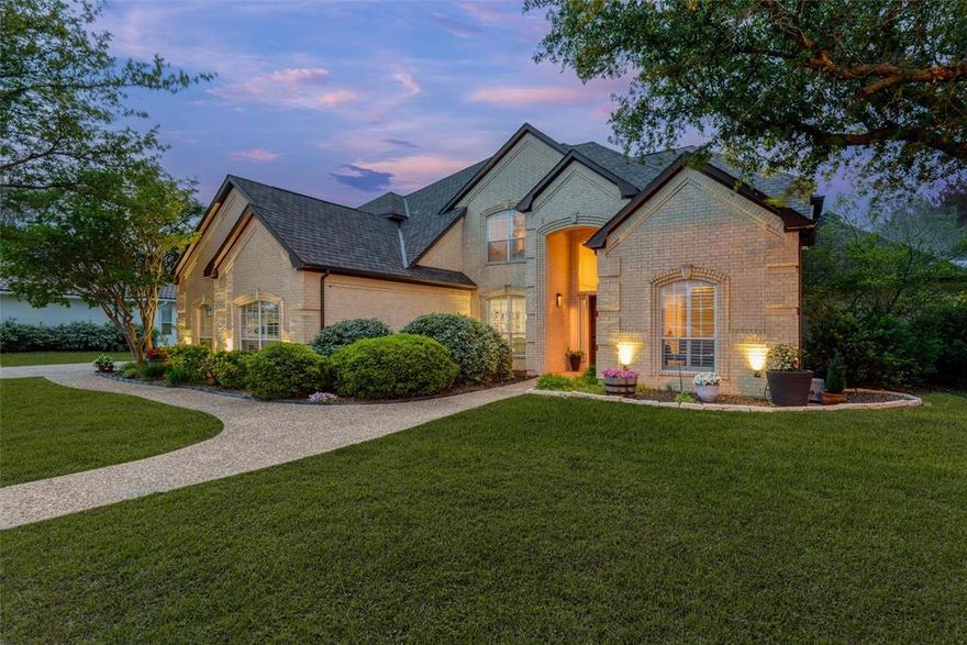 Luxury meets lake life in Eagle Chase at Tanglewood, a gated enclave just minutes from Lake Texoma, Highport Marina, and Tanglewood Resort. Built in 1999 and backing to the 14th green & 15th tee box, this 3,915 sq ft custom home offers golf course views, high-end finishes, and space to live, work, and entertain.
Inside, you'll find plantation shutters, architectural lighting, an eye-catching floor to ceiling wood-burning fireplace, and a gourmet kitchen with Quartz countertops, stainless double ovens, and a butler’s pantry with sink. The downstairs primary suite includes a newly remodeled spa bath with a standalone tub, large tiled shower, dual vanities - and a hidden safe room tucked inside the primary closet.
Upstairs features a media room, game room with wet bar and pool table, and balcony overlooking the course. With 5 bedrooms (or 4 + office), there's flexibility for guests, remote work, or hobbies.
The 3-car garage includes epoxy floors and space for a boat or golf cart. Outside, a custom pergola and covered patio invite you to relax and enjoy sunset views. 
Located in the Tanglewood Community HOA, Eagle Chase offers upscale living with access to golf, boating, striper fishing, and resort-style amenities - all just a 5-minute golf cart ride away. Custom homes, manicured lawns, and laid-back luxury define this neighborhood.
Whether you're seeking a forever home or weekend retreat, this one blends comfort, class, and convenience. Live where others vacation.