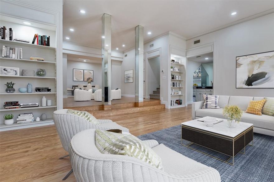 Set in a boutique building in one of Dallas’ most coveted neighborhoods, this front-corner, two-story residence blends timeless mid-century style with modern comfort and scale, all in a prime Turtle Creek location just minutes from the city’s best parks, trails, dining, and shopping. Soaring 11-foot ceilings, tall architectural windows, and a gas fireplace define the dramatic living room, creating a space that feels both elevated and inviting. Designed for entertaining and everyday living, the main level also boasts a second seating area, expansive dining room, wet bar, powder bath, and exceptional storage throughout. The kitchen offers generous cabinet and countertop space, stainless steel appliances, and in-unit washer and dryer, all thoughtfully positioned for efficiency and flow. Remote-controlled blinds, built-in shelving, and clean architectural lines reinforce the home’s refined, modern character. Upstairs, two true primary suites provide privacy and flexibility. Both feature walk-in closets and ensuite baths. One suite includes a private seating area with oversized windows, while the second opens to a balcony and showcases an updated bath.  Upgrades including HVAC, roof, wood flooring, and skylights were completed just a few years ago, offering peace of mind and long-term value. Outside your door, enjoy walkable access to Turtle Creek, the Katy Trail, and the vibrant dining and nightlife of Oak Lawn and Uptown, with Knox Street, Highland Park, and Downtown just minutes away. This is a rare opportunity to own a distinctive, design-forward home in the heart of Turtle Creek, where architecture, light, and an unbeatable central location come together beautifully.