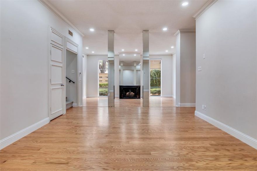 Set in a boutique building in one of Dallas’ most coveted neighborhoods, this front-corner, two-story residence blends timeless mid-century style with modern comfort and scale, all in a prime Turtle Creek location just minutes from the city’s best parks, trails, dining, and shopping. Soaring 11-foot ceilings, tall architectural windows, and a gas fireplace define the dramatic living room, creating a space that feels both elevated and inviting. Designed for entertaining and everyday living, the main level also boasts a second seating area, expansive dining room, wet bar, powder bath, and exceptional storage throughout. The kitchen offers generous cabinet and countertop space, stainless steel appliances, and in-unit washer and dryer, all thoughtfully positioned for efficiency and flow. Remote-controlled blinds, built-in shelving, and clean architectural lines reinforce the home’s refined, modern character. Upstairs, two true primary suites provide privacy and flexibility. Both feature walk-in closets and ensuite baths. One suite includes a private seating area with oversized windows, while the second opens to a balcony and showcases an updated bath.  Upgrades including HVAC, roof, wood flooring, and skylights were completed just a few years ago, offering peace of mind and long-term value. Outside your door, enjoy walkable access to Turtle Creek, the Katy Trail, and the vibrant dining and nightlife of Oak Lawn and Uptown, with Knox Street, Highland Park, and Downtown just minutes away. This is a rare opportunity to own a distinctive, design-forward home in the heart of Turtle Creek, where architecture, light, and an unbeatable central location come together beautifully.