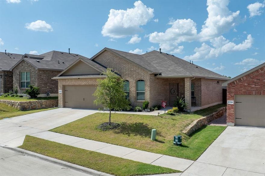 Welcome to this beautifully maintained home, built in 2022 by D.R. Horton. Featuring 4 spacious bedrooms, 2 full bathrooms, and a dedicated home office, this home blends modern design with practical living.  At the heart of the home is an open-concept kitchen with a peninsula island, granite countertops, and rich dark cabinetry—perfect for cooking, entertaining, or casual family meals. The kitchen flows effortlessly into the dining and living areas, creating a warm and inviting atmosphere.  Enjoy wood-look tile flooring throughout the living areas, kitchen, hallways, and bathrooms, with plush carpeting in all bedrooms for added comfort. Step outside to relax on the charming front porch or unwind under the covered back patio, ideal for outdoor gatherings year-round.  Located in a vibrant community Chapel Creek which offers great amenities, including a community pool and playground, this home has everything you need for comfortable and connected living.