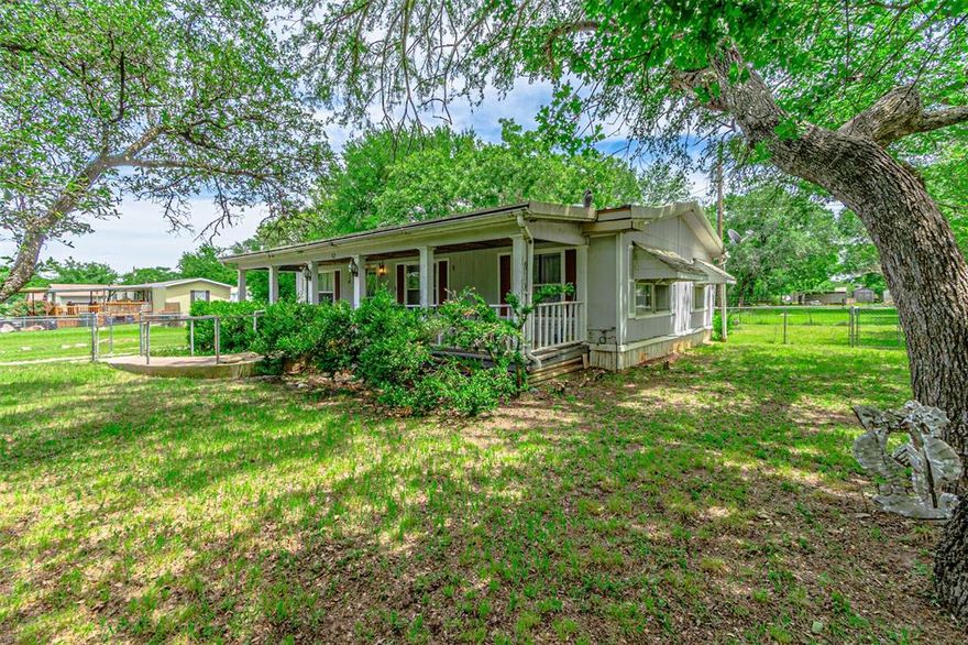 Investor opportunity with strong upside potential situated on approximately 2.5 lots. This double-wide mobile home offers 2 bedrooms and 2 bathrooms and has already undergone several recent improvements, including a fully renovated kitchen with new cabinetry and gas stove, updated primary bathroom, and some new flooring throughout.
The property is fully gated and includes two additional storage buildings, offering added space and flexibility for future use.
While improvements have been started, additional repairs and updates will be needed, making this property ideal for investors, flippers, or buyers looking to complete a project and add value. Certain systems, including plumbing and septic, are not currently known and should be evaluated by the buyer.
Property is being sold as-is. Seller will make no repairs. Cash only.
Buyer and buyer’s representative to verify all information, including square footage, condition, and utilities.
