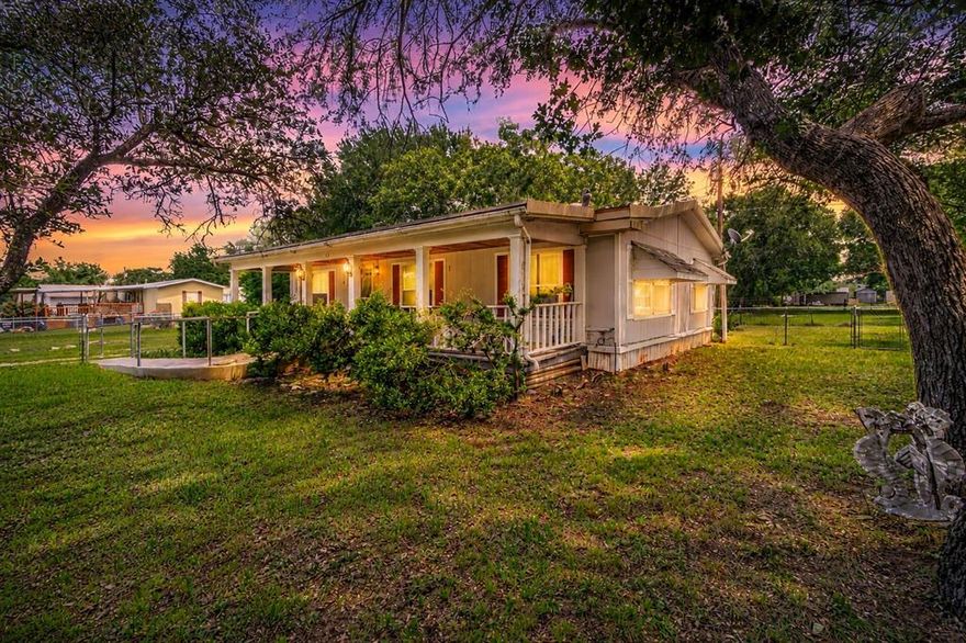 Investor opportunity with strong upside potential situated on approximately 2.5 lots. This double-wide mobile home offers 2 bedrooms and 2 bathrooms and has already undergone several recent improvements, including a fully renovated kitchen with new cabinetry and gas stove, updated primary bathroom, and some new flooring throughout.
The property is fully gated and includes two additional storage buildings, offering added space and flexibility for future use.
While improvements have been started, additional repairs and updates will be needed, making this property ideal for investors, flippers, or buyers looking to complete a project and add value. Certain systems, including plumbing and septic, are not currently known and should be evaluated by the buyer.
Property is being sold as-is. Seller will make no repairs. Cash only.
Buyer and buyer’s representative to verify all information, including square footage, condition, and utilities.