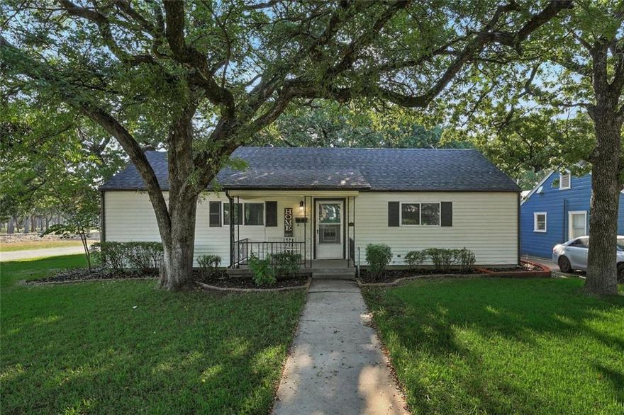 Tucked beneath a canopy of mature oaks in the heart of Fort Worth’s beloved Oakhurst neighborhood, this updated bungalow blends timeless charm with the modern conveniences today’s buyers crave. Perfectly positioned on a corner lot, the home welcomes you with fresh curb appeal thanks to a brand new roof and fresh paint and plenty of room to spread out with a detached garage and carport offering ample parking. Step inside to discover a bright, inviting layout highlighted by a modern kitchen with granite countertops and stainless steel appliances. The thoughtful updates continue throughout, but original bungalow character still shines through. The spacious primary suite is a rare find in Oakhurst, featuring a HUGE walk in closet and a beautifully updated bathroom. A versatile breezeway with washer & dryer hookups connects indoor living to the outdoors, offering the perfect flex space for hobbies, workouts, or casual lounging. Out back, a large, tree shaded yard creates a private retreat for entertaining, gardening, or relaxing under the Texas sky. Living in Oakhurst means more than just owning a home. It’s joining a true community. Neighbors here look out for each other, gather for block parties, and take pride in the neighborhood’s rich history. You’ll love strolling the leafy, walkable streets with your pup, chatting with friendly neighbors, or biking along nearby Trinity Trails. And with downtown Fort Worth just minutes away, you’ll have the city’s best dining, entertainment, and culture at your fingertips, all while enjoying the peace and serenity of this historic enclave. If you’ve been searching for the perfect balance of character, convenience, and community, welcome home to Oakhurst!