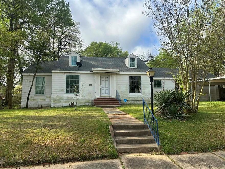 ***MOTIVATED SELLER***Back on he market due to buyer financing...not because of value or major property concerns.  The home appraised; however, lender required conditions didn't align with the buyer's financing situation.  Property is being sold strictly AS-IS and is best suited for cash buyers or investors.  Well… she may not be winning any beauty pageants right now, but as Cousin Eddie would say… “She’s a beaut, Clark!” 

If you’ve got vision (and maybe a solid toolbox), this one could be your next great success story. Featuring 4 generously sized bedrooms and 2 full bathrooms, there’s plenty of space here to bring your ideas to life. Whether you're dreaming of a flip, a rental investment, or creating a home that’s uniquely yours—this property is ready for its glow-up moment.

Out back, you’ll find a large workshop area attached to the garage—perfect for projects, storage, or finally having a place for all those “I’ll get to it someday” ideas. And let’s talk location—conveniently situated near Lamar Avenue and Clarksville Street, you’ll have quick access to shopping, dining, and all the essentials.

Now, let’s be honest… she’s a fixer-upper. She’s got character, stories, and maybe a few creaks to prove it. But with a little elbow grease (okay… maybe a bit more than a little), this property has the potential to shine again.

Opportunities like this don’t come around often—bring your imagination and come see what this one could be!
