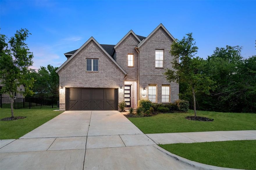 Welcome to your golf course, tree lined lot in the master planned community in The Bridges at Preston Xings.  Situated on almost an acre, this tree lined & creek view lot is both private & lush.  Inside upgrades include LVP flooring, quartz countertops, stainless hood & an electric fireplace.  The two story living area is open to the spacious dining & kitchen area, perfect for entertaining.  It also overlooks the beautiful private backyard view, which can be cleared beyond the fence line, as the property lines are located beyond with unlimited design opportunities.  The primary bedroom is also privately located at the back of the home with an oversized shower & custom tile.  Upstairs include a spacious game room, 3 secondary bedrooms & 2 baths. The Bridges community has luxurious amenities including a spacious clubhouse, community pool, tennis courts, fitness center, club & 18 hole golfing year round. Home zones to the highly acclaimed Gunter ISD with easy access to 121 & Preston.  The newly built Gunter Elementary is within the community.