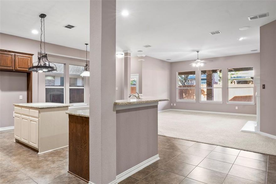 BRING AN OFFER. Major price drop to $177 per sq ft. Fresh paint in LV, dining room, entry way and half bath. Decorate for the Holidays with this multi-generational David Weekly home. TWO primary en-suites, one up one down, both with garden tubs, separate shower and walk-in closet. There is a spacious living room three large windows for bright light and a cozy gas fireplace perfect for hanging the Christmas stockings. Enjoy a dedicated office with French doors. The dining room showcases a tray ceiling, chandelier and crown molding. The deluxe eat-in kitchen features a large island with pendant hanging lights, granite countertops, 42-inch cabinets with appliance garage and GE Profile appliances with a convection double oven, built-in 5 burner gas cooktop, microwave, and dishwasher. A double Kohler SS sink with Kohler fixtures adds the perfect finishing touch. There is a generous 5 shelf pantry. The dedicated media room with surround sound comes complete with an 80-inch screen TV and deluxe seating for ultimate movie nights. With 3,279 sq. ft. of living space, this home is designed for comfort and convenience including the grand entryway, warm wood banister with wood dowels, premium crown molding, 7-room sound system including the garage and patio, multiple deluxe ceiling fans with lights, over-sized patio and a 3-car epoxy floor tandem garage perfect for a large SUV or truck with hot and cold sink and added electrical outlets. 2 ea. 50-gallon hot water heaters. Roof was replaced June of 2024. Recent wood fence. Lantana, offering 5 sparkling pools, 2 fitness centers, pickleball, tennis and basketball courts, parks and miles of walking & bike trails in this master-planned community allows utilizing the outdoors to its fullest. This home is perfect for multi-generational family or older child needing their space with two primary en-suites. Living in Lantana offers resort living with all the amenities, community events at Christmas, Halloween and more. Priced to sell.