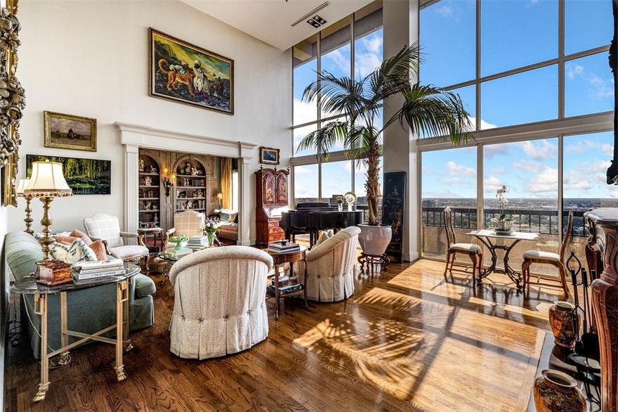 Experience the breathtaking views of Turtle Creek and downtown Dallas from this two story Penthouse in the coveted Warrington Condominiums. As you enter, you are greeted by a grand living room with oak floors, a wood burning fireplace and floor to ceiling windows. Off the living room is the library with custom pickled built-ins and plaster walls that provide an old Dallas feel. Not to be missed, is a private terrace stretching the length of the home. 

The spacious dining room was built for dinner parties, connecting the living room to the kitchen and providing additional views of the Creek. The breakfast nook might be the coziest corner of the home with its grasscloth wall coverings, custom cabinetry and designer fabric. The kitchen, custom silver pantry, private office and full sized laundry room complete the first floor. 

Making your way upstairs, you have the option of utilizing the classic stairway with brass handrails and a designer runner or the private elevator within the home. Once upstairs you step into the primary bedroom with floor to ceiling windows, pickled wood paneling, marble fireplace and designer wallpaper. Two primary baths and closets provide much desired space for the homeowners. 

The second floor contains a secondary front door, outdoor terrace, guest bedroom, full bath and numerous walk-in closets for storage. Four reserved parking spaces and a storage unit are included in the sale. 

Amenities within the Warrington include a salt water heated pool, Fitness Center, Tennis Court, PickleBall, valet parking, and an outstanding staff.