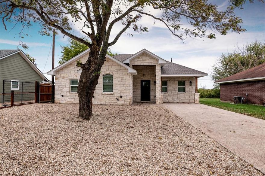 Nestled in a prime location, this beautifully crafted 3-bedroom, 2-bath residence offers the best of modern living just minutes away from some of Waco's most beloved landmarks. Ideally situated only 3 miles from the iconic Magnolia Market and 2.5 miles from Baylor University, this home strikes the perfect balance between urban convenience and serene comfort.

As you step inside, be greeted by a light-filled, open-concept living space that invites relaxation and effortless entertaining. The home's modern finishes are showcased throughout, with 2 inch  blinds and beautiful gray stained concrete floors offering both style and low maintenance. At the heart of the home, the open kitchen features stainless steel appliances, a breakfast bar, and stunning granite countertops, making it a culinary enthusiast's dream. Enjoy the convenience of having a refrigerator, washer, and dryer included.

Both bathrooms are thoughtfully designed, boasting custom tiled showers that provide a spa-like experience. Each bedroom offers ample space and comfort, perfect for unwinding at the end of the day.

Transitioning to the outdoors, you'll discover a charming covered gazebo in the backyard, perfect for hosting while relishing in the peace and tranquility provided by the surrounding open land. The private fenced backyard offers an oasis for relaxed outdoor living and entertaining.