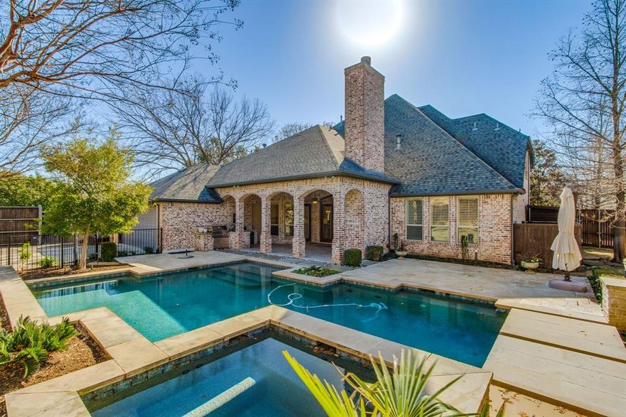 NEW PRICE & OPEN SUN 1-3! GORGEOUS HOME located in Prairie Creek! Thoughtfully designed & READY to welcome you! Embrace the epitome of luxury living in this exquisite Victor Myers custom home built in 2010. Recently updated with stylish finishes thoughtfully chosen to create style & comfort-Paint; Kitchen; Bathrooms. The foyer sets the tone with high ceilings, natural light, & hardwood floors, hinting at the bckyrd oasis! Family room w coffered ceiling, gas log stone FP & built-ins. Kitch is centered around island, providing space for meal prep & gatherings. Breakfast rm w FP offering warmth & charm. Updates: Quartz, white tile backsplash, painted cabinets & Wolf appliances: Dbl ovens, MW, & dishwasher. Primary suite is modernized w updated counters, sinks tub & shower. Split bdrms & baths, workout & gameroom.The bckyrd is the perfect retreat year-round w covered patio, WBFP & grilling station overlooking pool & spa w water features creating your outdoor oasis! LIST OF UPDATES IN DOCS