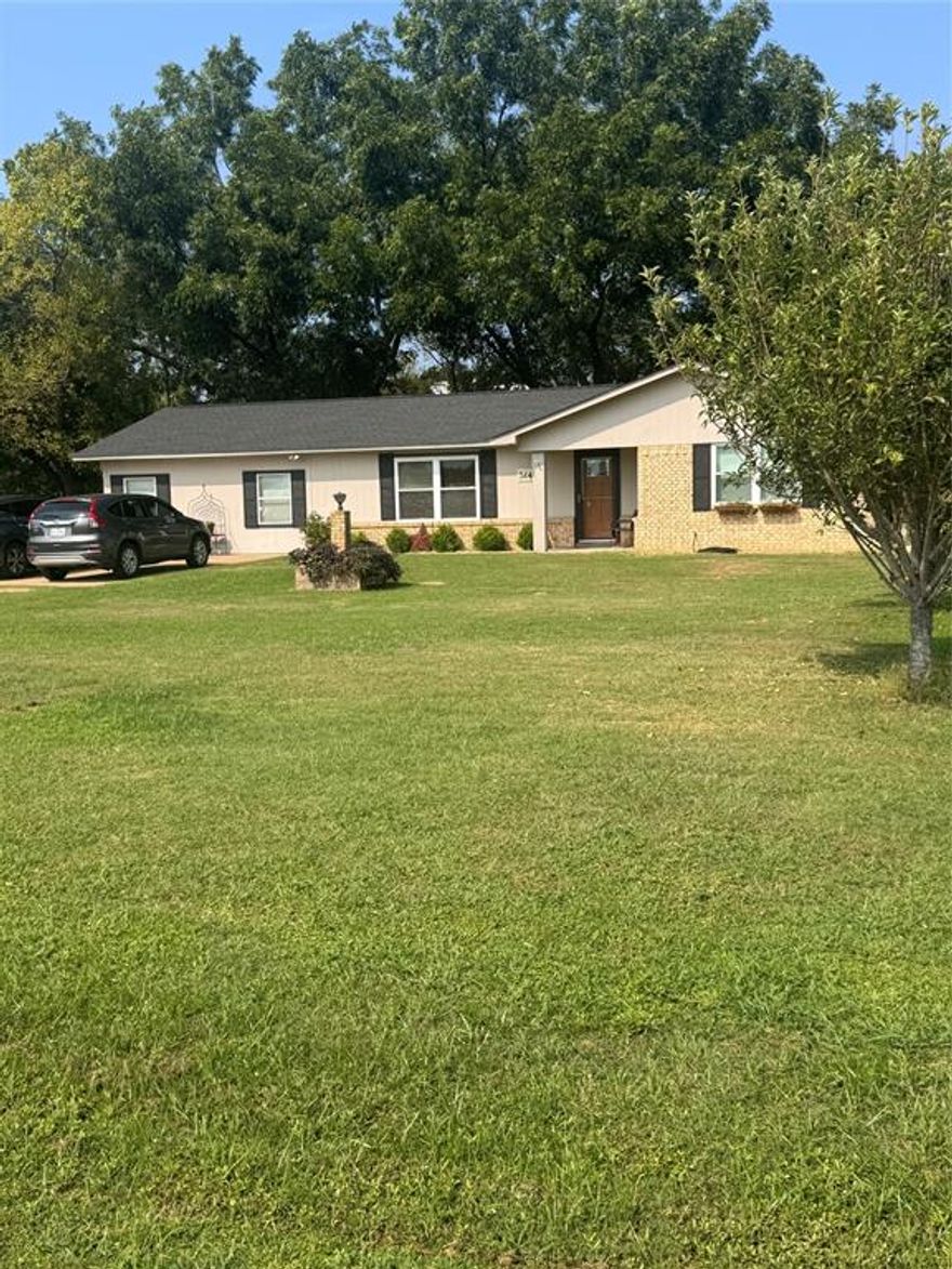 Updated brick home featuring 3 bedrooms, 2 baths, and 2 spacious living areas.  Newer windows, roof, septic system, and more! Inside you’ll find decorator colors and finishes throughout, giving the home a stylish and inviting feel. Sitting on a large lot with a fenced backyard, this property also offers a storage shed with concrete floor. Conveniently located close to town, this home combines comfort, updates, and charm in one great package!