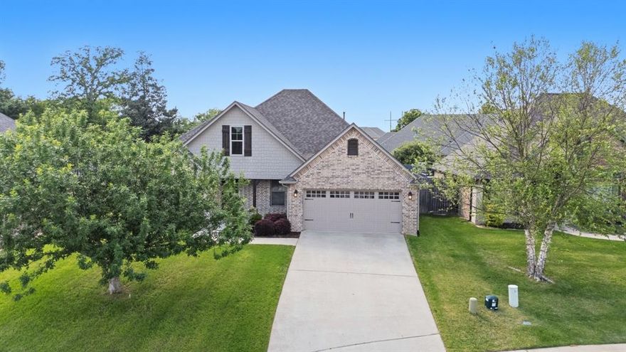Spacious and thoughtfully designed, this 4-bedroom, 2-bath home offers comfort and functionality for everyday living. Built in 2017 and tucked away on a peaceful cul-de-sac, it combines modern living with a prime, convenient location—just a short walk to FRESH, restaurants, walking trails, and more.

The open-concept layout features a cozy fireplace, welcoming dining area, and a well-appointed kitchen complete with large island with additional seating—perfect for entertaining or casual meals—plus an oversized walk-in pantry for ample storage.

The split primary suite provides privacy and relaxation, featuring a luxurious en-suite bath with separate vanities, a soaking tub, and an oversized walk-in shower. A generously sized utility room, conveniently accessible from the primary closet, adds everyday ease.

Step outside to enjoy the covered back porch, ideal for relaxing or hosting gatherings year-round. Blending practical features with inviting spaces, this home is ready to suit a variety of lifestyles.
