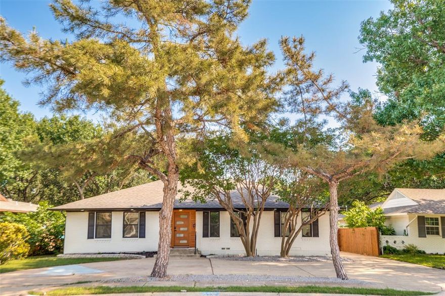 Location, updates, and move-in ready living in East Dallas. This fully remodeled home in the North Hill Estates neighborhood, completely rebuilt for today's living within an open concept design. Major updates include new insulation, drywall, roof, windows, flooring, HVAC, electrical, plumbing, and appliances for true peace of mind. FAMILY ROOM off of kitchen with dry bar and wine refrigerator, closet for storage, and direct access to the backyard. This versatile space can also serve as a 4th bedroom if needed. 

Inside, the open-concept floor plan feels bright and fresh with white interiors, black fixtures, and modern finishes throughout. The updated kitchen features stainless steel appliances, white countertops, a stylish gray backsplash, and a spacious walk-in pantry and laundry area. The  primary en suite offers a private retreat, while the secondary bedrooms share a central hall bath. 
 The home features a circular driveway, gated driveway parking, grassy backyard, outdoor storage, and a newly built covered carport or gazebo ideal for covered parking, outdoor dining, or entertaining. With ample parking and extensive updates throughout, this turnkey East Dallas home offers modern living in a prime location close to everything the neighborhood is known for, including Central Market, Baylor Medical District, Central Expressway, White Rock Lake, Dallas hiking and biking trails, and all the dining, nightlife, and shopping along Greenville Avenue. Perfect lock and leave property or an amazing short term rental with a central Dallas location.