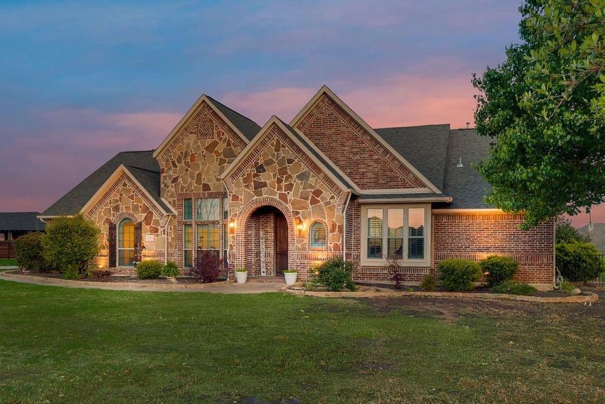 Experience peaceful country living with city convenience in this beautifully updated home on a spacious 1 acre lot in Forney. Freshly painted inside and out, this home features a fantastic, flexible floor plan designed for both comfort and entertaining. Step into a grand entry with soaring ceilings that creates a stunning first impression. The home offers 4 bedrooms, 3 full baths, a formal dining room, private office (or optional 5th bedroom), and an oversized upstairs game room. The fourth bedroom upstairs has been used as a media room, providing extra versatility. The upstairs carpet was replaced in 2025, adding a fresh, move-in-ready feel. The spacious kitchen is perfect for gatherings with abundant cabinet space and a bright breakfast nook overlooking the backyard, flowing seamlessly into the main living areas. The split-bedroom primary suite offers privacy and a relaxing retreat, complete with a spa-like ensuite bath featuring a jacuzzi tub, separate shower, and large walk-in closet with built-ins. Enjoy the outdoors in the oversized backyard with a covered patio, ideal for entertaining or unwinding while taking in the wide-open space. Additional highlights include a 3-car garage and plantation shutters throughout. The freshly landscaped flowerbed creates stunning curb appeal from the moment you arrive.