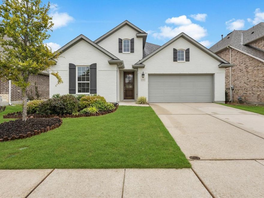 With three bedrooms, a private study, and thoughtful updates throughout, this 2020-built home is designed for both comfort and flexibility. Located in the gated community of Willow Creek at Auburn Hills and zoned to Prosper ISD with Reeves Elementary nearby, it combines a neighborhood feel with everyday convenience. Engineered wood flooring flows through the living areas and study, creating warm, inviting spaces for gathering, working, or relaxing. The kitchen is a natural hub of the home, finished with quartz countertops, upgraded hardware, a walk-in pantry, GE Profile stainless steel appliances, and a 5-burner gas cooktop with vent hood. Whether it’s a quick breakfast before school or hosting friends on the weekend, this space adapts easily to the moment. The primary suite offers a retreat of its own, with a spacious walk-in closet that connects directly to the laundry room for everyday ease. Bathrooms feature modern 12x24 tile, while two additional bedrooms provide room for family or guests. The dedicated study is perfectly suited for a home office, playroom, or hobby space - offering flexibility as needs change. The garage adds both function and style with epoxy flooring, an EV charger, and bonus storage space. Outside, the oversized covered patio is plumbed for gas and ready for grilling, dining, or relaxing while overlooking updated landscaping. Life in Auburn Hills offers more than a beautiful home: it’s a lifestyle. The community features multiple pools, parks, playgrounds, and a recreation center, along with trails that wind through greenbelts and natural spaces. It’s easy to stay active, gather with neighbors, or simply enjoy the outdoors without leaving the neighborhood. With shopping, dining, and medical facilities close by, Auburn Hills delivers the perfect balance of convenience, connection, and everyday retreat.