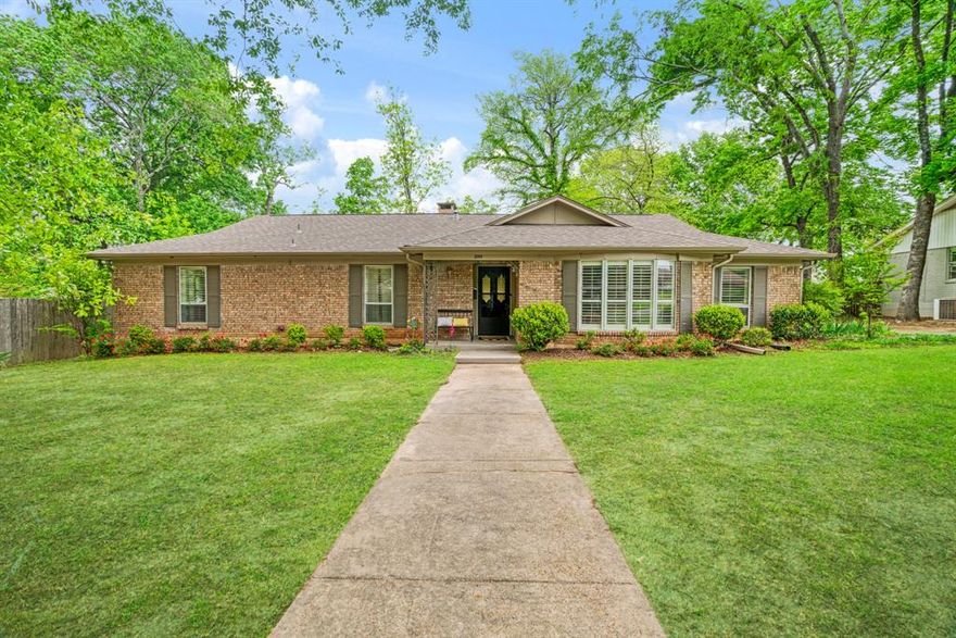 Updated 3 bedroom 2 bath Johnson Woods home that is ready for you to move in and enjoy!  Beautifully redone with granite counters, engineered hardwood floors, wood burning fireplace and private lush back yard!  The front living are is currently being used as a music room but can be utilized for many uses and also features a large den area!  The atrium window in the breakfast area will make for peaceful morning coffee!  Conveniently located to schools, beauty shop, banks, restaurants, Paris Junior College and walking track!  Don't miss out on this gem!