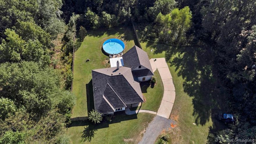 LOCATION, LOCATION! Peaceful country living awaits in Haughton! This custom-built 2009 home sits on approximately 3 private acres, perfectly tucked off the road and surrounded by mature trees. The spacious layout features 5 bedrooms total and over 2,400 sq ft. 4 bedrooms and 2 full baths downstairs, plus a half bath and 5th bedroom upstairs, offering flexibility for guests, a home office, or bonus space. Open concept for the living room and kitchen! Master bedroom is remote from the other bedrooms. Step outside and enjoy your own above-ground pool, open yard space, and the quiet privacy that country life offers. A new roof in 2023 adds peace of mind, while the property’s long private drive and peaceful surroundings create that true “home-in-the-country” feel. Conveniently located in Haughton..just minutes from great schools, restaurants, the interstate, and more! This home blends comfort, privacy, and convenience in one perfect package. More photos COMING SOON!