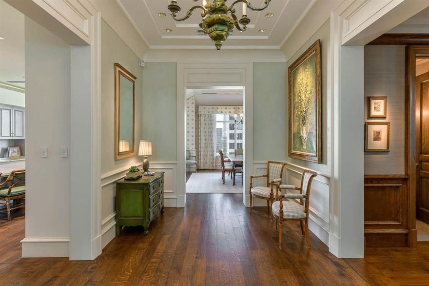 This is a rare opportunity to live in The Mansion Residences. With two homes per floor, there are only 24 residences, making it one of the most private and exclusive buildings in Dallas. Located on the eighth floor, this 3,879-square-foot home includes 2 beds, 3.2 baths, an office, and 3 terraces totaling 532 square feet that offer breathtaking views. Designed by a dream team—designer Emily Summers, architect Bernbaum-Magadini, and lighting designer Barbara Bouyea—find an elegant aesthetic with gleaming hardwood floors, automated drapes, a Lutron lighting system, and plaster walls. The formal living boasts custom built-ins and an attached terrace; the gourmet kitchen offers a walk-in pantry and breakfast nook; and the primary suite boasts a private terrace and his-hers marble baths and walk-in closets. Also included are 2 parking spots, a temp-controlled storage unit, and amenities such as 24-hr concierge and valet, as well as the Rosewood Mansion’s pool, spa, and 24-hr room service.