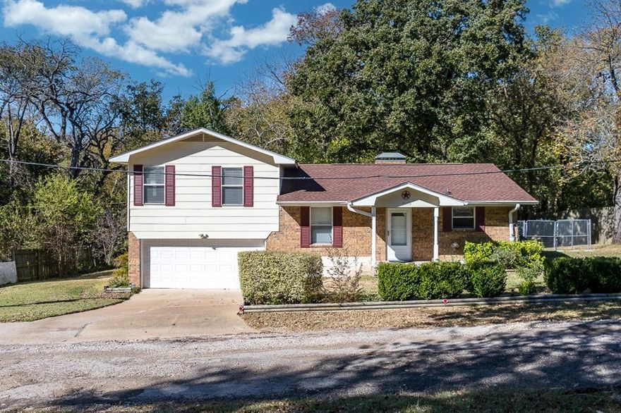 Seamlessly blend country charm with commuter accessibility, this beautifully maintained home offers the best of living. Located on a corner of Hwy 175 and Hilltop Drive in Kemp, you are just minutes from the waters of Cedar Creek Lake and enjoy an effortless drive to both Dallas and Tyler. Situated on a generous half-acre lot with a fully fenced backyard, this property is the perfect sanctuary for family, kids, and pets alike. Step inside to find a truly turnkey property, defined with recent major investments. The kitchen shines with sleek granite countertops, a modern electric range, and durable luxury vinyl plank (LVP) flooring that extends through the main living areas. The thoughtful layout features an upper-level master suite with a bath and a second bedroom, while the lower level has a third bedroom or office off of the living room, offering an ideal separation of space. Comfort is guaranteed year-round with a 14.3 SEER HVAC system installed in August 2025 and new attic insulation added in 2023. This home has been meticulously cared for, providing buyers with immediate peace of mind. Major structural and cosmetic improvements include a roof (May 2024) with updated fascia and soffits, a septic system (only 6 years old), and nine foundation piers installed in 2022 with a post-installation pressure test. With all improvement receipts filed in Transaction Desk, you can buy with absolute confidence. This is more than a home; it's worry-free living!