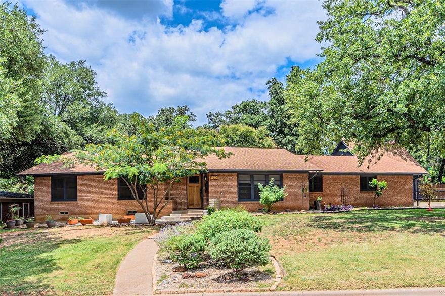 Discover this beautiful mid century ranch, perfectly situated on a large corner lot in the Forest Park neighborhood of Arlington. Step inside to find stunning refinished wood floors, a bright and welcoming layout, and a kitchen featuring a gas range, perfect for home chefs.  Updates include HVAC and water heater in 2021, fireplace interior restoration and new glass double doors installed off the family and dining room in 2025.  The 4th bedroom has room to add an ensuite bathroom and could be converted into a second primary or guest suite. 

Outdoors, you’ll enjoy almost half an acre designed for entertaining and hobbies, complete with RV or boat parking, two storage sheds or workshop, and plenty of room to spread out.  Above the garage you will find a versatile upstairs flex space providing endless possibilities, whether you need a playroom, home office, or creative studio.
 
This property is a rare find as an updated, spacious home with room to live, play, and entertain, all in a prime Arlington location. Just minutes from AT&T Stadium, Globe Life Park, and top-rated amusement and water parks, this home offers the ideal balance of convenience, space, and style.

Virtual staging used in some photos to show use of space.