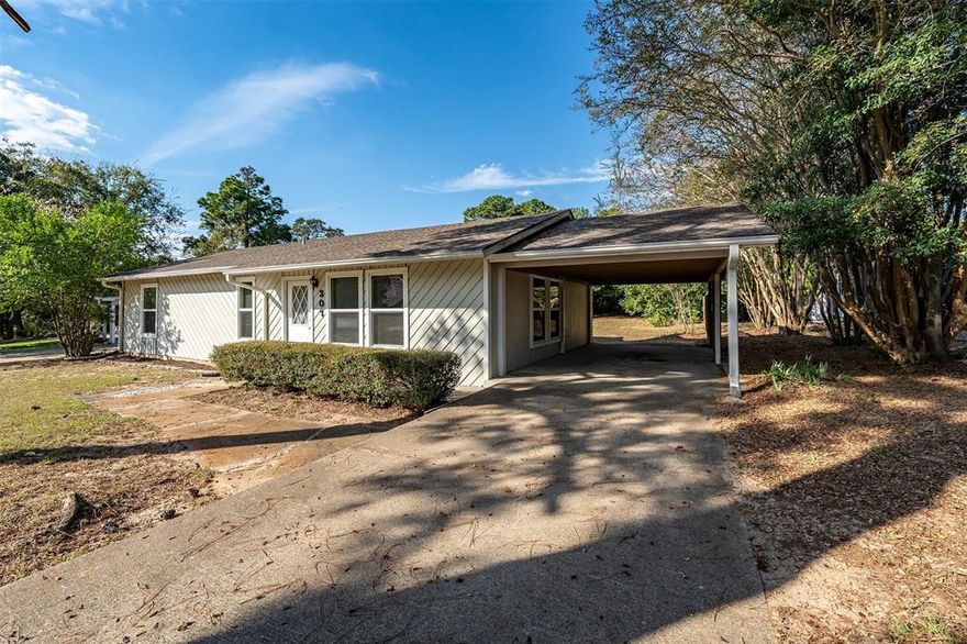 Welcome to peace and fun in the same location within Hide A Way this home is perfect for a retirement home or a small family with the open floorplan and large living room and 2 bedrooms with a walk through bath and a half the flow is great this home feels bigger than the Sf no wasted space and tons of storage in the kitchen the neighborhood is wonderful with 9 hole golf courses clubhouse swimming pool the restaurant is wonderful and 24 hour security this is just what your looking for in East Texas beautiful trees great spring fed lakes and rolling streets you will enjoy this Gem of a community