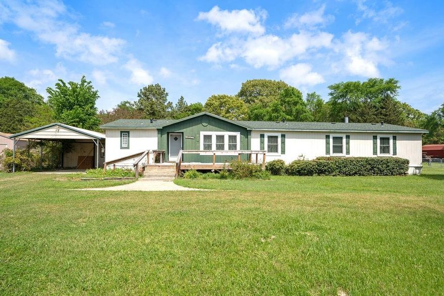 Welcome home to this one of a kind 5 bedroom, 3 full bath manufactured home in the Gale Ridge addition of Chandler, TX! Sitting on a large lot, this property offers the space, layout, and flexibility that’s hard to find at this price point. Step inside to over 2,100 square feet with a comfortable, open feel from the moment you walk in. The main living area flows easily into the dining space and kitchen, where you’ll find a center island, plenty of cabinetry, and a sink perfectly positioned under a window bringing in natural light. A second living area with a fireplace gives you options for a media room, playroom, or additional entertaining space. The primary suite is generously sized with an en suite bath and a large closet, while four additional bedrooms offer plenty of room for family, guests, or a home office setup. With two more full bathrooms, the layout is both functional and accommodating. Outside, you’ll enjoy a large front porch deck and a covered back deck, ideal for relaxing or hosting. The detached carport includes its own storage room, and there’s an additional shed in the backyard for even more storage. Located on a quiet street just minutes from Lake Palestine and all that Chandler has to offer, this home checks a lot of boxes for space, value, and location. Come take a look and see if this one feels like home!