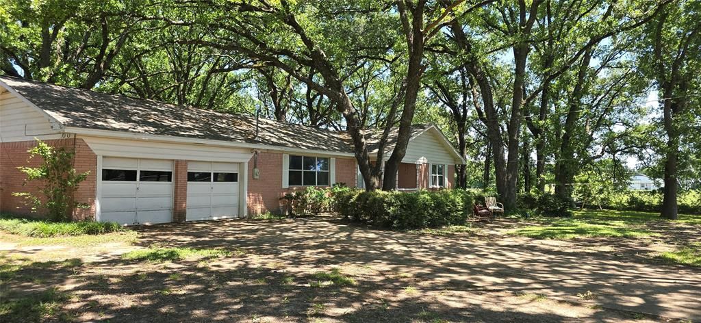 Photo of 610 N Fm Road #1389, Combine, TX 75159 (MLS # 21268641)