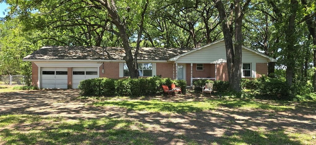 Photo of 610 N Fm Road #1389, Combine, TX 75159 (MLS # 21268641)