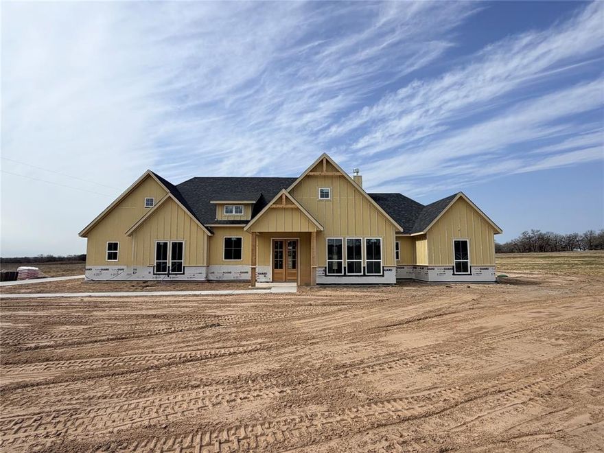 The Rebekah Plan, where spectacular design meets charming character! Spanning 2,675 square feet, Inside, every detail speaks to comfort and versatility 4 spacious beds, 4 full baths, a convenient half bath, & dedicated office or flex. The great room features a vaulted shiplap ceiling, a cozy wood-burning fireplace, & stunning views of the rear porch. The dining room is open to the great room with seamless access to outdoor living, perfect for entertaining or family meals with a view. The kitchen is a chef’s dream, featuring a large center island, custom cabinetry with under-cabinet lighting, a huge pantry, & all the modern amenities one would desire. The owner’s suite offers a luxurious retreat with vaulted ceilings, toe-kick lighting, & a generous walk-in closet. The ensuite bath elevates relaxation with dual vanities featuring lit mirrors, a separate tub, & a spacious walk-in shower. Two more bedrooms each boast their own ensuite, ensuring privacy & comfort for family or guests. This home includes a comprehensive tech package to enhance daily living: security cameras & a smart doorbell for peace of mind, surround sound & wall-mounted TV outlets for easy entertaining, under-cabinet lighting and toe-kick lighting in the master and kitchen, lit mirrors in the master bath, & high-end finishes such as Delta faucets, decorative mirrors, & spray-foam insulation for efficiency. Outdoor Living at Its Best! The back porch is an entertainer’s paradise, featuring an outdoor kitchen to include a grill, sink, & prep area. This porch has plenty of space to savor sunsets, share meals, or simply unwind. Nestled in historic Granbury, Offering rural tranquility with modern conveniences: no city taxes, no water bill, & no HOA. A short drive to downtown Granbury Square provides shopping, dining, culture, & you’re about 15 minutes from Lake Granbury Marina for boating, fishing, and lakeside recreation. Txt keyword ZHB11 to 88000 for Virtual Tour & builder details.