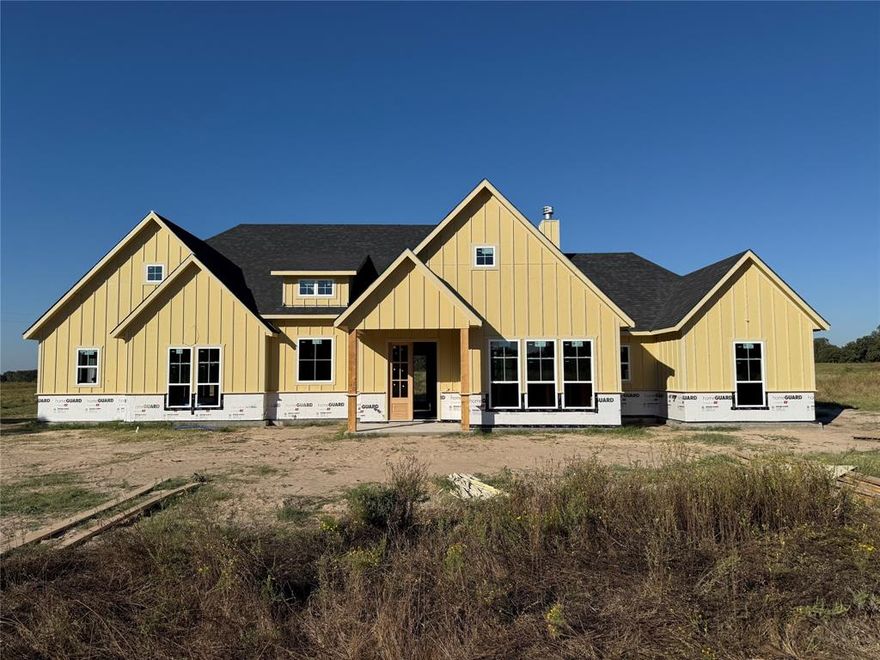 The Rebekah Plan, where spectacular design meets charming character! Spanning 2,675 square feet, Inside, every detail speaks to comfort and versatility 4 spacious beds, 4 full baths, a convenient half bath, & dedicated office or flex. The great room features a vaulted shiplap ceiling, a cozy wood-burning fireplace, & stunning views of the rear porch. The dining room is open to the great room with seamless access to outdoor living, perfect for entertaining or family meals with a view. The kitchen is a chef’s dream, featuring a large center island, custom cabinetry with under-cabinet lighting, a huge pantry, & all the modern amenities one would desire. The owner’s suite offers a luxurious retreat with vaulted ceilings, toe-kick lighting, & a generous walk-in closet. The ensuite bath elevates relaxation with dual vanities featuring lit mirrors, a separate tub, & a spacious walk-in shower. Two more bedrooms each boast their own ensuite, ensuring privacy & comfort for family or guests. This home includes a comprehensive tech package to enhance daily living: security cameras & a smart doorbell for peace of mind, surround sound & wall-mounted TV outlets for easy entertaining, under-cabinet lighting and toe-kick lighting in the master and kitchen, lit mirrors in the master bath, & high-end finishes such as Delta faucets, decorative mirrors, & spray-foam insulation for efficiency. Outdoor Living at Its Best! The back porch is an entertainer’s paradise, featuring an outdoor kitchen to include a grill, sink, & prep area. This porch has plenty of space to savor sunsets, share meals, or simply unwind. Nestled in historic Granbury, Offering rural tranquility with modern conveniences: no city taxes, no water bill, & no HOA. A short drive to downtown Granbury Square provides shopping, dining, culture, & you’re about 15 minutes from Lake Granbury Marina for boating, fishing, and lakeside recreation. Txt keyword ZHBHOME20 to 88000 for Virtual Tour & builder details.