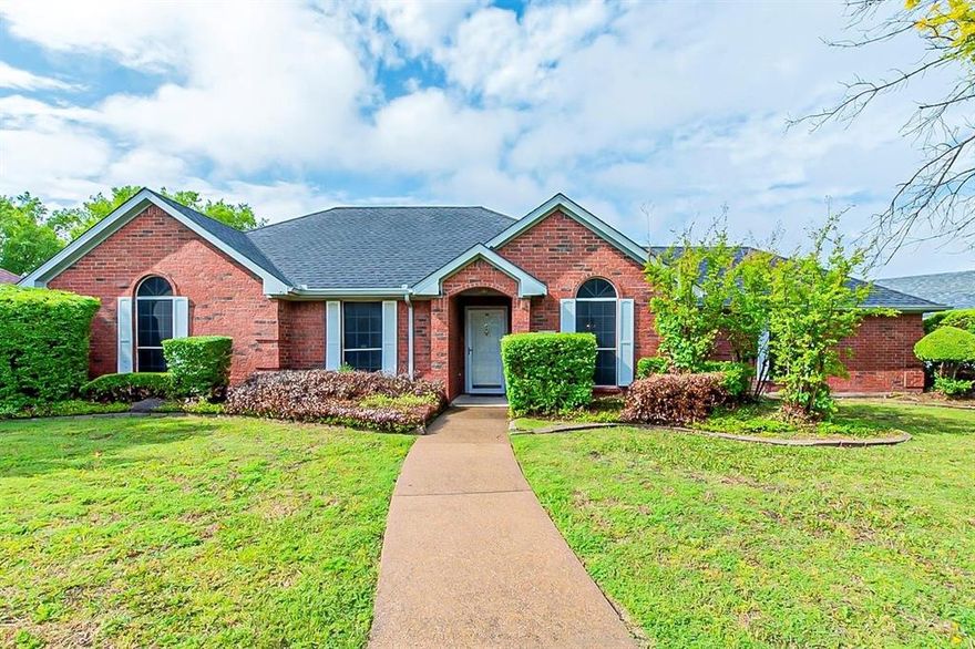 Welcome to this charming single-story residence nestled in the desirable Hunters Ridge subdivision of Sachse. Built in 1991, the home features 3 bedrooms and 2 full bathrooms across approximately 1,284 square feet of living space. 
Step inside to a light-filled open layout with a welcoming living area anchored by a cozy fireplace. The kitchen boasts granite countertops and ample workspace – perfect for meal preparation or casual entertaining. 
All bedrooms are conveniently located on the main level. The primary suite enjoys easy access to a full bath, and the two additional bedrooms share a second full bathroom, making this home functional for family or guests alike.
Outside you’ll find a generous lot of approximately 10,146 square feet, offering plenty of room to create an outdoor retreat or backyard playground. 
A two-car attached garage adds convenience and extra storage options.
Situated in a strong Sachse location, this home is ideal for those looking for comfort, accessibility and value in the Dallas-area market. With its turnkey appeal, it’s ready for you to move in and begin making memories.