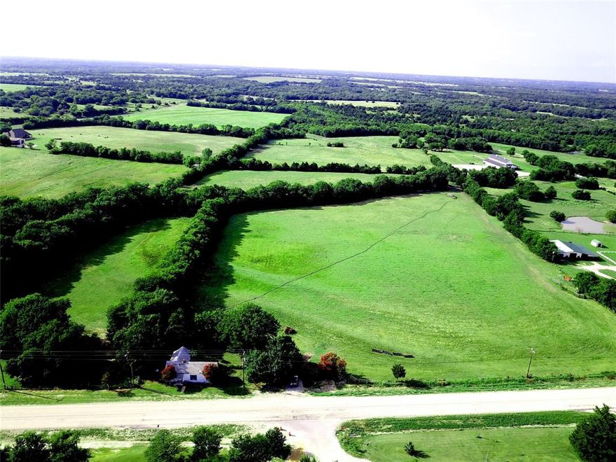 The old Grider home place is a landmark of Cannon Texas. The old house and barn remain. A great place to build a new home. Improved pastures fenced and cross fenced. Pastures and fencing are in great condition. Several old water wells on the property that were essential to country living before co-op water.  Small creeks divide pastures with trees scattered around the property and heavily treed in the back of the property. Many beautiful trees Pecan, Oak and Cedar Elm. Would also be ideal to subdivide and make a quiet country neighborhood. All utilities along the frontage of FM 121 Located in the highly acclaimed Van Alstyne ISD.